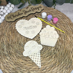 Decorative cutouts of a heart, cupcake, and ice cream cone with 'Emilie' 