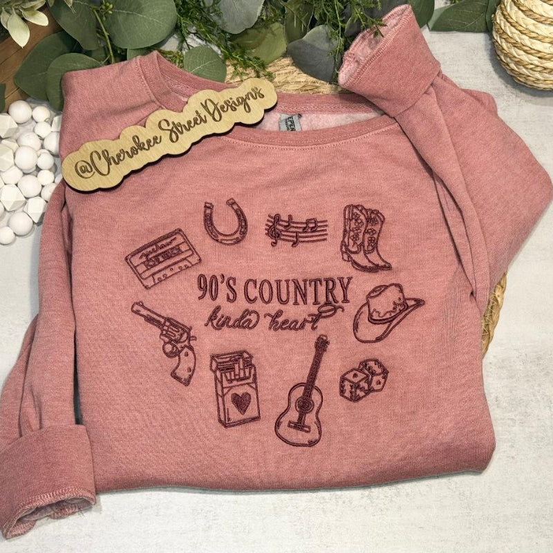 Pink sweatshirt with '90's Country Kinda Heart' design 