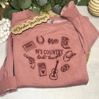 Pink sweatshirt with '90's Country Kinda Heart' design 