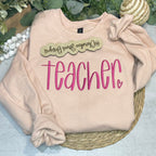 Handwritten teacher embroidered on a sweatshirt 