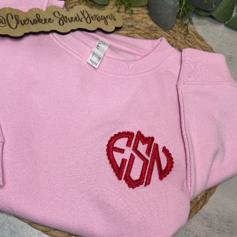 Pink hoodie with red logo 
