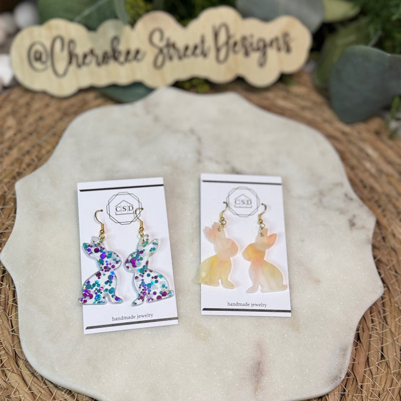 Earring cards with floral and animal designs