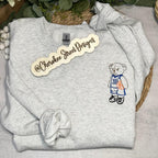 Gray sweatshirt with a teddy bear design 