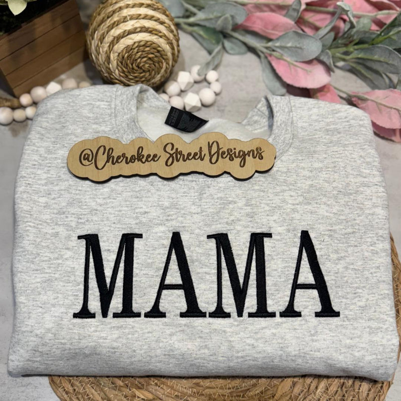 Gray sweatshirt with 'MAMA' text 