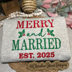 sweatshirt with 'Merry and Married Est. 2025' text 