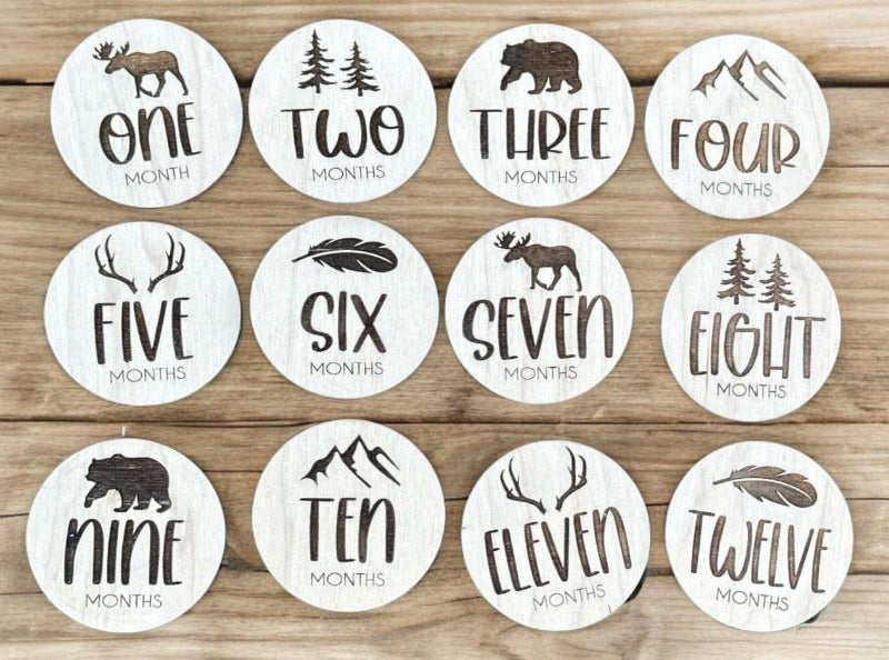 wood set with milestone labels for baby's first year