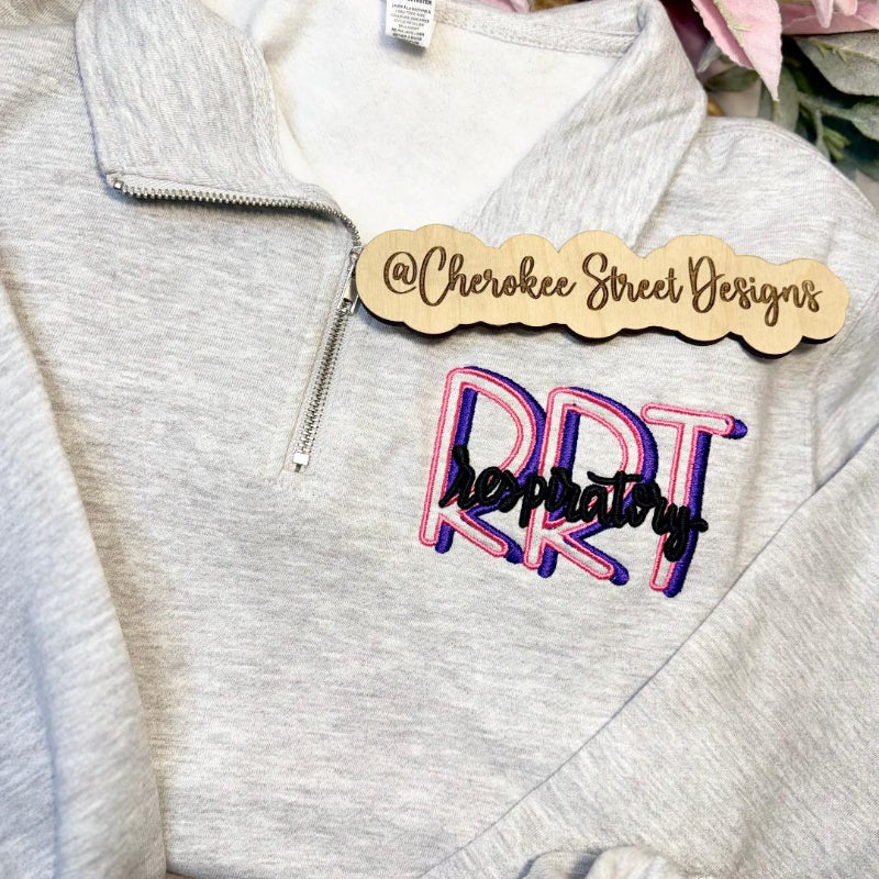 Gray sweatshirt with colorful text