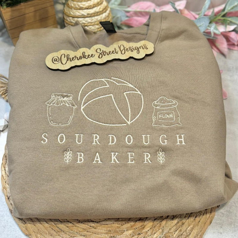 Brown sweatshirt with 'Sourdough Baker' design 