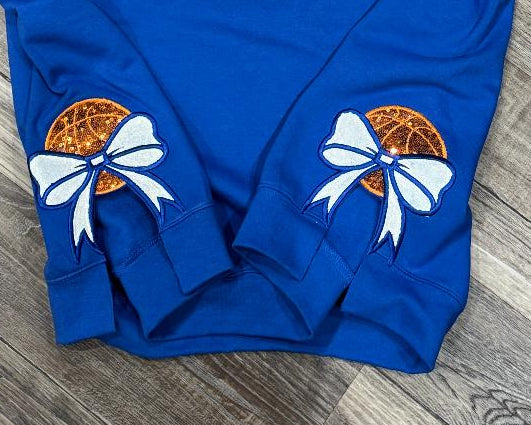Blue sweatshirt with basketball side bows